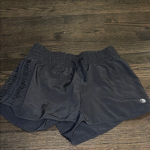 mpg black shorts with design down the side